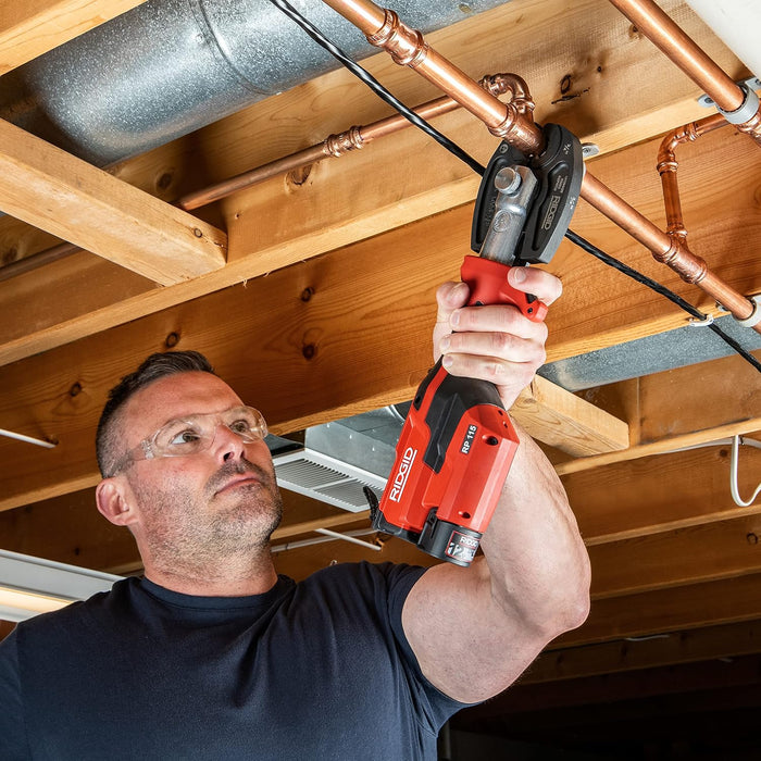 RIDGID (RP115) 72553 Mini Press Tool and Battery Kit with 1/2" to 3/4" ProPress Press Tool Jaws, 2V Li/Ion Battery, 12V Charger, and Carrying Case